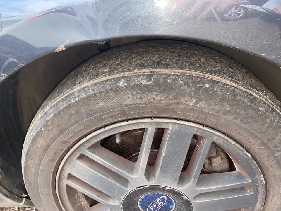 The worn tyres of one of the cars